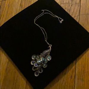 Sterling silver chain with peacock charm